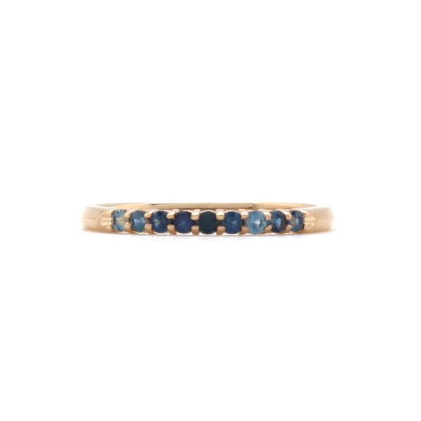 Blue sapphire and gold band